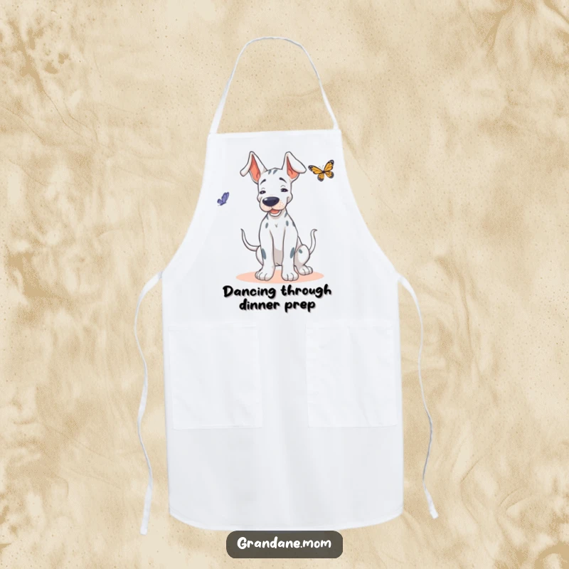 Funny Grand Dane apron, a dog doing a playful wiggle, dancing with a butterfly in a kitchen setting.