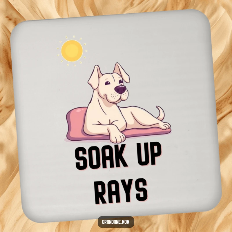 Funny Grand Dane drink coaster featuring a content dog stretching in the sun, offering surface protection with serene canine humor.