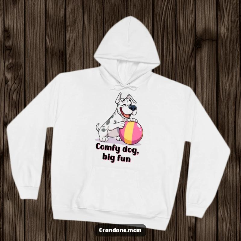 Funny Grand Dane hoodie, playfully nudging a huge, vibrant ball, radiating warmth and canine happiness for cozy wear.