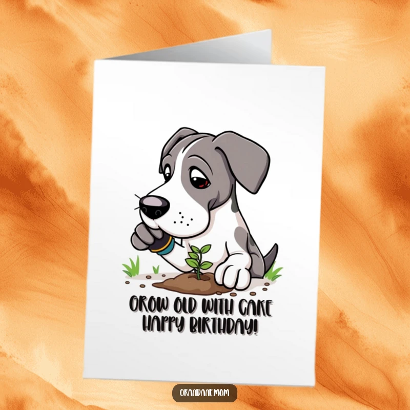 Funny Free Printable Birthday Card: Great Dane in gardening gloves gently planting a tiny seedling with a hopeful expression.