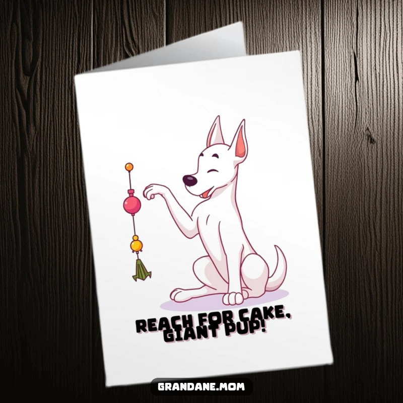Funny Free Printable Birthday Card: A graceful Grand Dane stretches towards a tempting dangling toy.