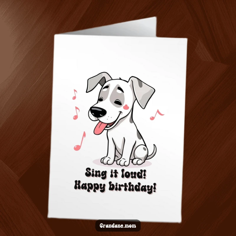 Funny Free Printable Birthday Card: Great Dane with a musical note above its head, humming joyfully with closed eyes and a serene expression.