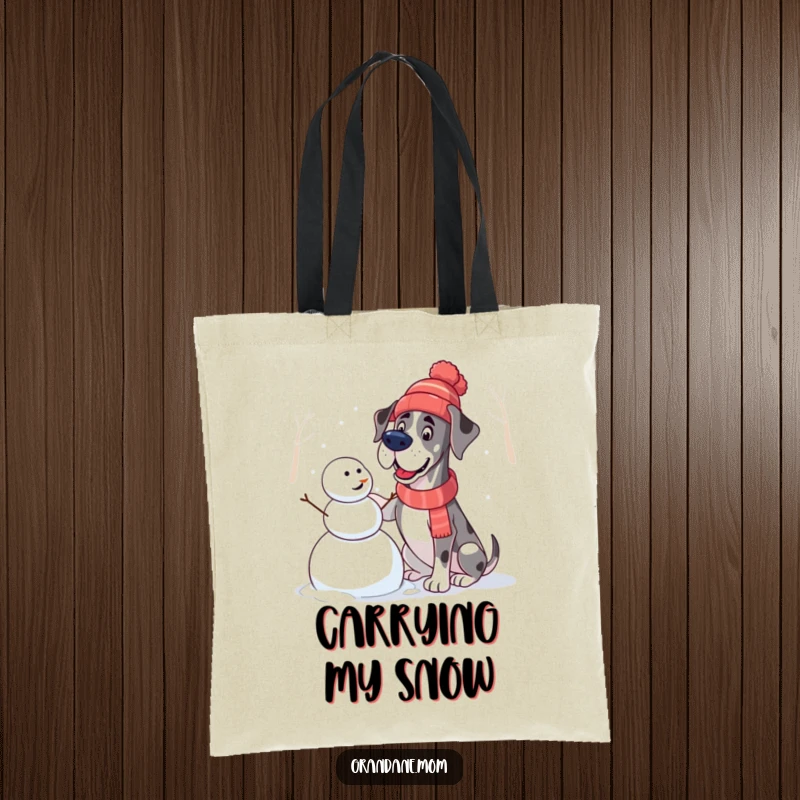 Funny Great Dane Tote Bag: A dog in a hat joyfully builds a snowman, perfect for humorous winter shopping.